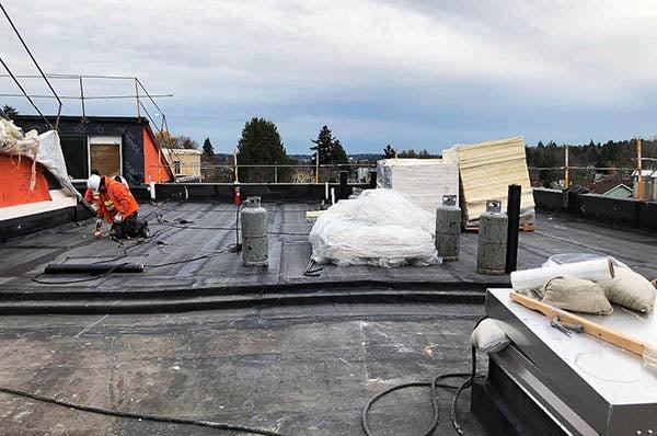 Adding roof drains and preparing for MDF paneling in the gym - Nov. 2021